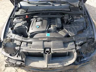 2007 BMW 3 Series 328xi with VIN WBAVC93587K031632, listed as a IAAI auction lot 41711350 with 184,703 mi miles. Bid and sale history available at carsss.com. Image 10.