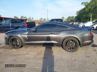 2018 Ford Mustang EcoBoost с VIN 1FA6P8THXJ5172021, выставлен на аукционе IAAI как лот 42170389 с пробегом 71 772 миль миль и . История ставок и продаж доступна на DreamBid. Изображение 14.