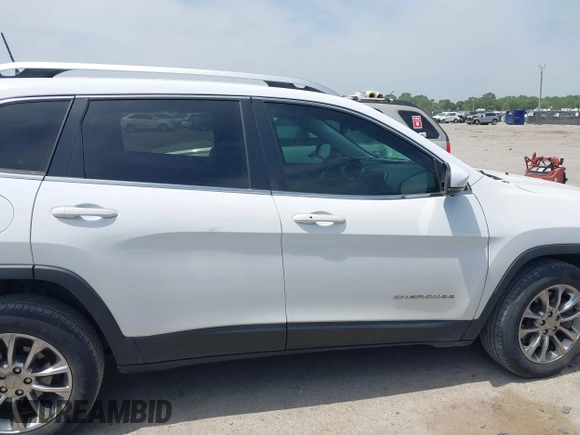 2019 Jeep Cherokee Latitude Plus with VIN 1C4PJLLBXKD220221, listed as a IAAI auction lot 42060125 with 89,452 mi miles and . Bid and sale history available at DreamBid. Image 13.