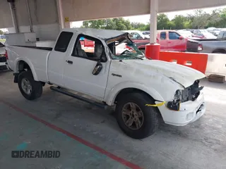 2005 Ford Ranger XL z VIN 1FTZR15E85PA55477, wystawiony jako IAAI lot #42420217 z przebiegiem 163 123 mil mil oraz . Historia ofert i sprzedaży dostępna na DreamBid. Obrazek 1.
