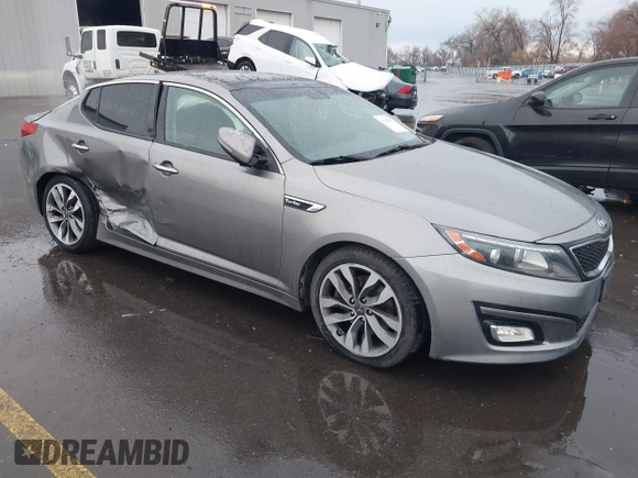 2015 Kia Optima SX Turbo with VIN 5XXGR4A66FG361755, listed as a IAAI auction lot 41199887 with 114,179 mi miles. Bid and sale history available at carsss.com. Image 1.