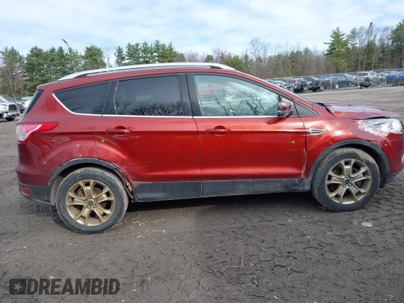 2015 Ford Escape Titanium with VIN 1FMCU9JX1FUA56091, listed as a IAAI auction lot 41947035 with 191,297 mi miles and . Bid and sale history available at DreamBid. Image 13.
