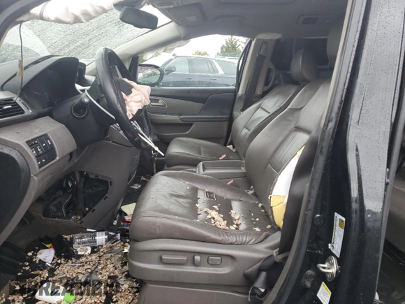 2014 Honda Odyssey Touring with VIN 5FNRL5H95EB056118, listed as a Copart auction lot 57729865 with Not provided miles and Salvage title. Bid and sale history available at DreamBid. Image 7.