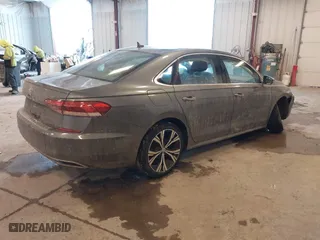2021 Volkswagen Passat 2.0T SE with VIN 1VWSA7A30MC000721, listed as a IAAI auction lot 41614367 with 98,621 mi miles. Bid and sale history available at carsss.com. Image 4.