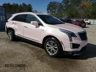 2023 Cadillac XT5 FWD Premium Luxury with VIN 1GYKNCR44PZ159363, listed as a Copart auction lot 49511915 with 42,382 mi miles and Salvage Title. Bid and sale history available at carsss.com. Image 4.