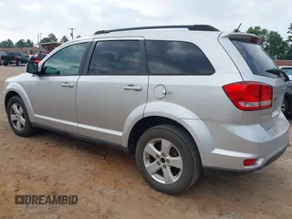 2012 Dodge Journey SXT z VIN 3C4PDCBG4CT189046, wystawiony jako IAAI lot #42410786 z przebiegiem 147 928 mil mil oraz . Historia ofert i sprzedaży dostępna na DreamBid. Obrazek 3.