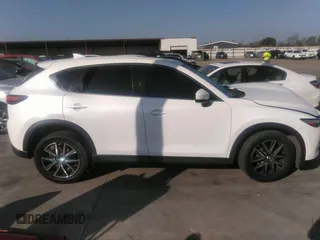 2018 Mazda CX-5 Grand Touring with VIN JM3KFADM4J0309540, listed as a IAAI auction lot 41868480 with 89,110 mi miles. Bid and sale history available at carsss.com. Image 14.