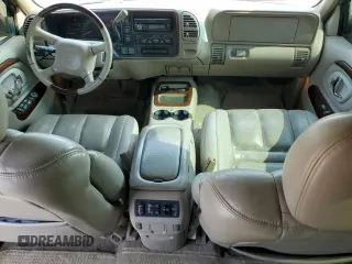 2000 Cadillac Escalade z VIN 1GYEK63R2YR210601, wystawiony jako Copart lot #64108944 z przebiegiem 186 964 mil mil oraz Szkody całkowita. Historia ofert i sprzedaży dostępna na DreamBid. Obrazek 8.