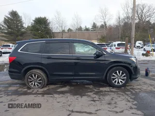 2020 Honda Pilot EX-L z VIN 5FNYF6H50LB022798, wystawiony jako IAAI lot #41592012 z przebiegiem 67 045 mil mil oraz . Historia ofert i sprzedaży dostępna na DreamBid. Obrazek 13.