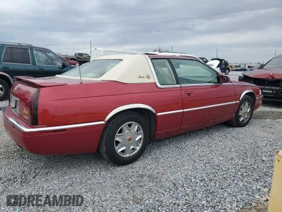 2001 Cadillac Eldorado ESC z VIN 1G6EL12Y11B103541, wystawiony jako Copart lot #45219055 z przebiegiem 46 179 mil mil oraz Tytuł czysty. Historia ofert i sprzedaży dostępna na DreamBid. Obrazek 3.