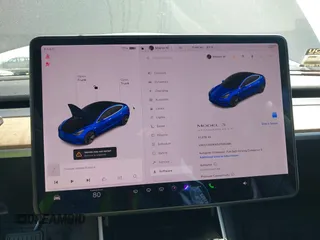 2020 Tesla Model 3 Standard Range Plus with VIN 5YJ3E1EA1LF590396, listed as a IAAI auction lot 41868089 with 51,278 mi miles. Bid and sale history available at carsss.com. Image 18.