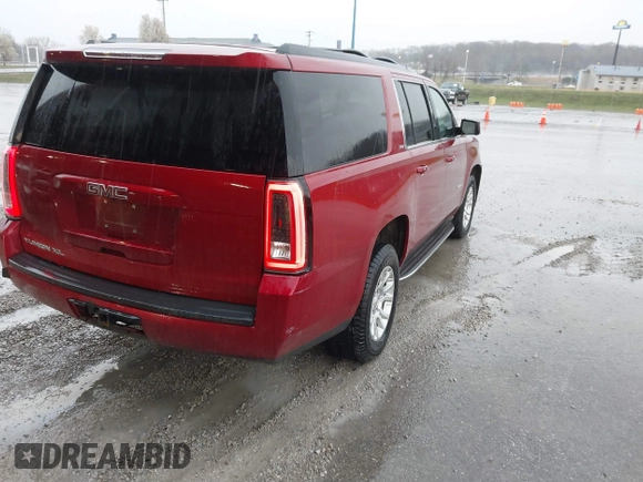 2015 GMC Yukon XL SLT with VIN 1GKS2HKC6FR501993, listed as a IAAI auction lot 41902491 with 205,669 mi miles. Bid and sale history available at carsss.com. Image 4.