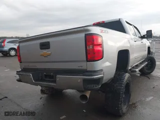2019 Chevrolet Silverado 2500HD LTZ with VIN 1GC1KTEY4KF157917, listed as a IAAI auction lot 41174836 with 106,013 mi miles. Bid and sale history available at carsss.com. Image 4.