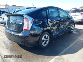 2013 Toyota Prius One with VIN JTDKN3DU5D1721701, listed as a IAAI auction lot 42039097 with 167,497 mi miles and . Bid and sale history available at DreamBid. Image 4.