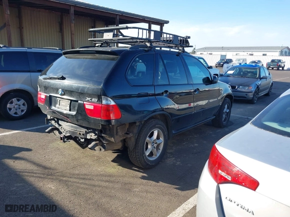 2005 BMW X5 3.0i with VIN 5UXFA13585LY10856, listed as a IAAI auction lot 41745279 with 153,748 mi miles. Bid and sale history available at carsss.com. Image 4.