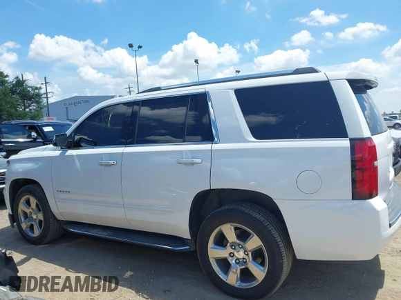 2020 Chevrolet Tahoe LTZ with VIN 1GNSCCKCXLR215899, listed as a IAAI auction lot 40128171 with 109,541 mi miles and . Bid and sale history available at DreamBid. Image 14.