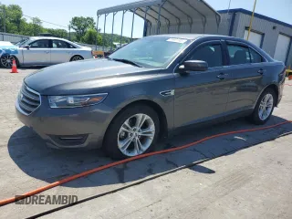 2015 Ford Taurus SEL z VIN 1FAHP2E83FG125234, wystawiony jako Copart lot #54404745 z przebiegiem 107 311 mil mil oraz Szkody całkowita. Historia ofert i sprzedaży dostępna na DreamBid. Obrazek 1.