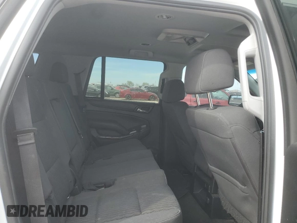 2018 Chevrolet Tahoe LS with VIN 1GNSCAEC8JR351011, listed as a Copart auction lot 49420825 with 83,322 mi miles and Salvage title. Bid and sale history available at DreamBid. Image 12.
