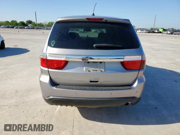2013 Dodge Durango SXT z VIN 1C4RDHAGXDC697865, wystawiony jako Copart lot #52635305 z przebiegiem 206 980 mil mil oraz Czysty tytuł • Clean title. Historia ofert i sprzedaży dostępna na DreamBid. Obrazek 6.