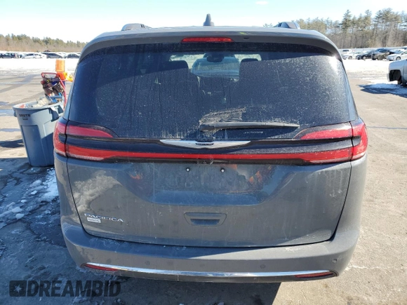 2021 Chrysler Pacifica Touring L with VIN 2C4RC1BG1MR552939, listed as a Copart auction lot 45279645 with 67,229 mi miles and Salvage Title. Bid and sale history available at DreamBid. Image 6.