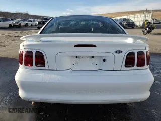1997 Ford Mustang with VIN 1FALP4045VF120213, listed as a Copart auction lot 85335614 with 71,225 mi miles and Salvage Title. Bid and sale history available at carsss.com. Image 6.