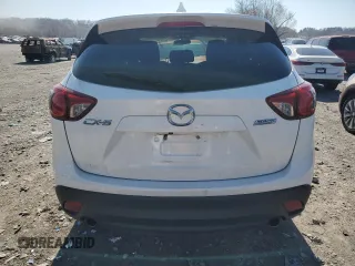2015 Mazda CX-5 Touring with VIN JM3KE2CY4F0436082, listed as a Copart auction lot 50505365 with 140,835 mi miles and Clean Title. Bid and sale history available at DreamBid. Image 7.