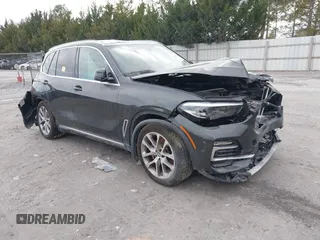 2021 BMW X5 sDrive40i with VIN 5UXCR4C07M9G60674, listed as a IAAI auction lot 38203174 with 1 mi miles. Bid and sale history available at carsss.com. Image 1.