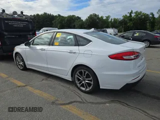 2020 Ford Fusion SEL with VIN 3FA6P0CD1LR154201, listed as a IAAI auction lot 42715761 with 99,448 mi miles and . Bid and sale history available at DreamBid. Image 4.