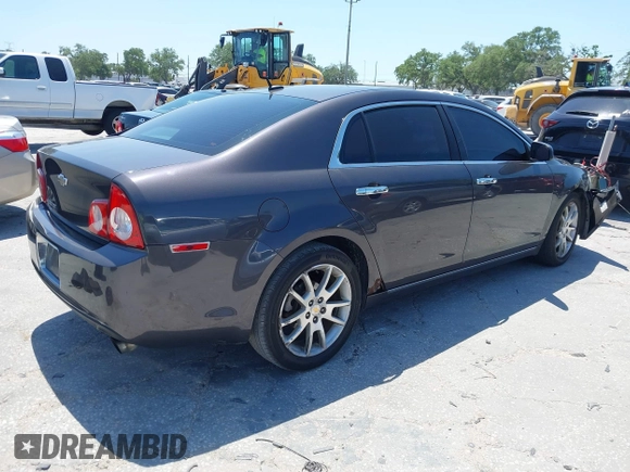 2011 Chevrolet Malibu LTZ with VIN 1G1ZE5E75BF184694, listed as a IAAI auction lot 42002433 with 185,724 mi miles and . Bid and sale history available at DreamBid. Image 4.