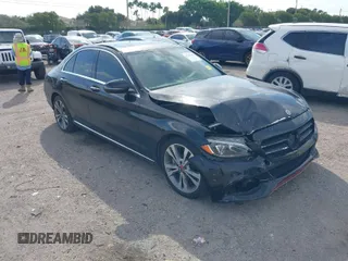 2018 Mercedes-Benz C with VIN WDDWF4JBXJR406032, listed as a IAAI auction lot 41762349 with 114,854 mi miles. Bid and sale history available at carsss.com. Image 1.