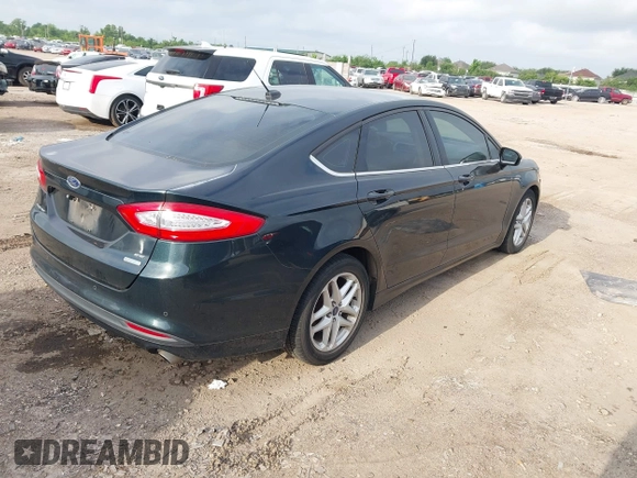 2014 Ford Fusion SE with VIN 3FA6P0HD3ER184294, listed as a IAAI auction lot 42141660 with 216,696 mi miles. Bid and sale history available at carsss.com. Image 4.