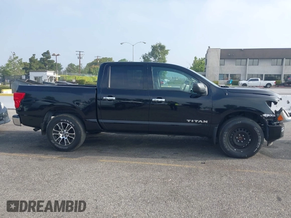 2021 Nissan Titan Pro-4X with VIN 1N6AA1ED8MN502425, listed as a IAAI auction lot 42464389 with 38,957 mi miles and . Bid and sale history available at DreamBid. Image 14.