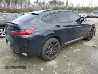 2023 BMW X4 M with VIN 5YM23EC03P9S24918, listed as a Copart auction lot 45127705 with 9,817 mi miles and Salvage Title. Bid and sale history available at carsss.com. Image 3.