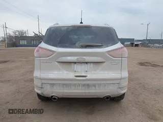 2015 Ford Escape Titanium with VIN 1FMCU9J92FUA60166, listed as a IAAI auction lot 41914080 with 103,122 mi miles and . Bid and sale history available at DreamBid. Image 16.