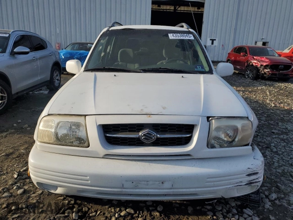 2000 Suzuki Grand Vitara JLX z VIN JS3TD62V4Y4121259, wystawiony jako Copart lot #43538045 z przebiegiem 127 915 mil mil oraz Szkoda całkowita • Salvage title. Historia ofert i sprzedaży dostępna na DreamBid. Obrazek 5.