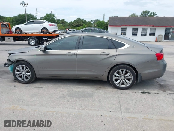 2017 Chevrolet Impala with VIN 1G1105S37HU143971, listed as a IAAI auction lot 42091671 with 137,310 mi miles and . Bid and sale history available at DreamBid. Image 15.