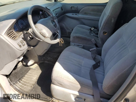 2002 Toyota Sienna LE with VIN 4T3ZF13CX2U458385, listed as a Copart auction lot 69523254 with 187,836 mi miles and Salvage Title. Bid and sale history available at carsss.com. Image 7.