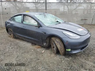2023 Tesla Model 3 with VIN 5YJ3E1EA2PF434910, listed as a Copart auction lot 48523135 with 0 mi miles and Non Repairable. Bid and sale history available at carsss.com. Image 4.