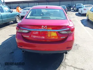 2016 Mazda 6 i Grand Touring с VIN JM1GJ1W50G1430328, выставлен на аукционе IAAI как лот 41879262 с пробегом 122 545 миль миль и . История ставок и продаж доступна на DreamBid. Изображение 17.