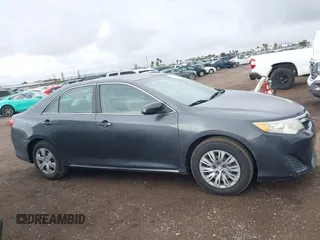 2014 Toyota Camry L with VIN 4T1BF1FK5EU403313, listed as a IAAI auction lot 42141338 with 185,925 mi miles and . Bid and sale history available at DreamBid. Image 13.