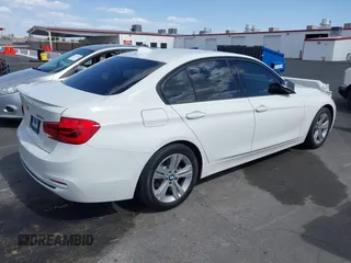 2016 BMW 3 Series 328i z VIN WBA8E9C50GK648594, wystawiony jako IAAI lot #42221766 z przebiegiem 127 590 mil mil oraz . Historia ofert i sprzedaży dostępna na DreamBid. Obrazek 4.