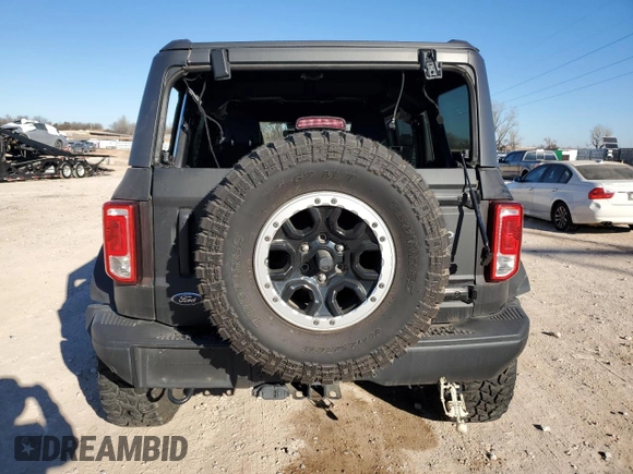 2021 Ford Bronco with VIN 1FMEE5DH0MLA77066, listed as a Copart auction lot 87551145 with 62,610 mi miles and Salvage title. Bid and sale history available at DreamBid. Image 6.