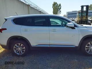 2020 Hyundai Santa Fe SE with VIN 5NMS23AD8LH285363, listed as a IAAI auction lot 42408647 with 60,058 mi miles and . Bid and sale history available at DreamBid. Image 14.