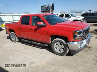 2017 Chevrolet Silverado 1500 LT with VIN 3GCUKREH6HG376269, listed as a Copart auction lot 51812935 with 119,966 mi miles and Salvage Title. Bid and sale history available at DreamBid. Image 4.