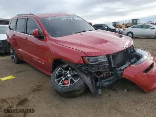2015 Jeep Grand Cherokee SRT with VIN 1C4RJFDJ4FC136861, listed as a Copart auction lot 86754194 with 98,262 mi miles and Salvage Title. Bid and sale history available at carsss.com. Image 4.