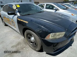 2012 Dodge Charger Police with VIN 2C3CDXAG0CH295515, listed as a Copart auction lot 51870315 with 128,837 mi miles and Clean Title. Bid and sale history available at carsss.com. Image 1.
