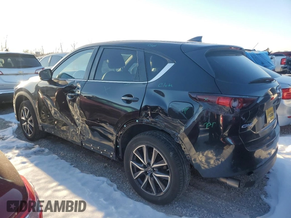 2018 Mazda CX-5 Touring z VIN JM3KFACM9J0300642, wystawiony jako Copart lot #80210854 z przebiegiem 118 309 mil mil oraz Szkoda całkowita • Salvage title. Historia ofert i sprzedaży dostępna na DreamBid. Obrazek 2.