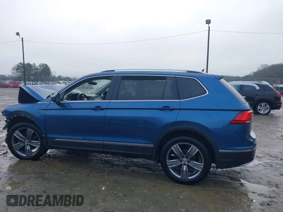 2020 Volkswagen Tiguan SE z VIN 3VV3B7AX5LM176136, wystawiony jako IAAI lot #41564431 z przebiegiem 74 867 mil mil oraz . Historia ofert i sprzedaży dostępna na DreamBid. Obrazek 14.