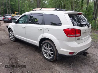2015 Dodge Journey SXT with VIN 3C4PDCCG2FT690956, listed as a IAAI auction lot 42515701 with 145,676 mi miles and . Bid and sale history available at DreamBid. Image 3.