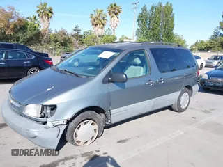 1999 Toyota Sienna LE z VIN 4T3ZF13C0XU117228, wystawiony jako IAAI lot #42384745 z przebiegiem 292 487 mil mil oraz . Historia ofert i sprzedaży dostępna na DreamBid. Obrazek 6.